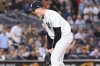 FILE - New York Yankees pitcher Tim Hill reacts after striking out Boston Red Sox' Roman Anthony during the seventh inning of a baseball game, Aug. 21, 2025, in New York. (AP Photo/Pamela Smith, file)