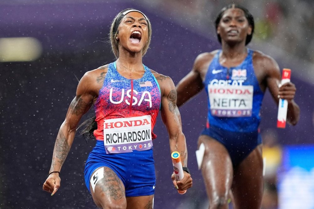 FILE - United States' Sha'Carri Richardson celebrates as she anchors the team to gold ahead of Britain's Daryll Neita in the women's 4 X 100 meters relay final at the World Athletics Championships in Tokyo, Sept. 21, 2025. (AP Photo/Petr David Josek, File)