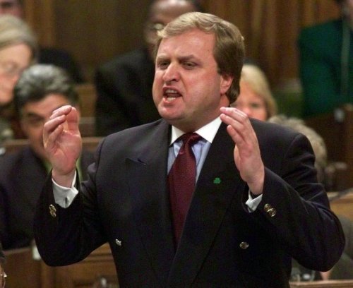 Sergio Marchi speaks in the House of Commons in Ottawa on Wednesday, March 17, 1999. (THE CANADIAN PRESS/Tom Hanson)