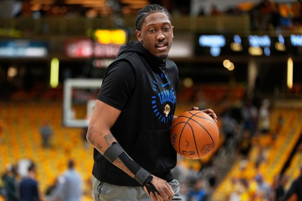 FILE - Oklahoma City Thunder forward Jalen Williams warms up prior to Game 6 of the NBA Finals basketball series against the Indiana Pacers Thursday, June 19, 2025, in Indianapolis. (AP Photo/Abbie Parr, File)