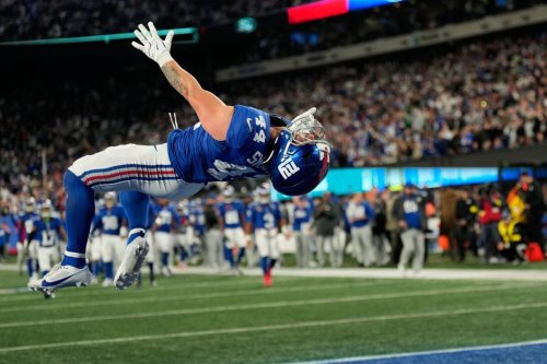 New York Giants' Cam Skattebo reacts after a touchdown during the second half of an NFL football game against the Philadelphia Eagles Thursday, Oct. 9, 2025, in East Rutherford, N.J. (AP Photo/Seth Wenig)
