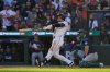 Detroit Tigers' Javier Báez watches his two-run home run during the sixth inning in Game 4 of baseball's American League Division Series against the Seattle Mariners Wednesday, Oct. 8, 2025, in Detroit. (AP Photo/Ryan Sun)