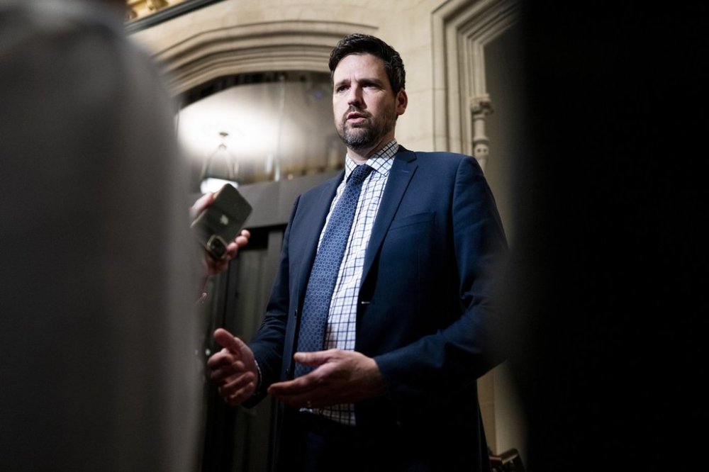 Minister of Justice Sean Fraser speaks to reporters ahead of a caucus meeting on Parliament Hill in Ottawa on Wednesday, Oct. 8, 2025. THE CANADIAN PRESS/Spencer Colby