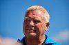 Ontario Premier Doug Ford speaks to media at the 2025 International Plowing Match in Grassie, Ont., on Tuesday, Sept. 16, 2025. THE CANADIAN PRESS/Sammy Kogan