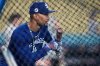 Los Angeles Dodgers shortstop Mookie Betts works out ahead of Game 3 of the 2025 World Series against the Toronto Blue Jays in Los Angeles, Sunday, Oct. 26, 2025. (AP Photo/Ashley Landis)