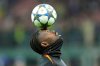 Inter Milan's Marcus Thuram keeps his eyes on the ball as he warms up ahead of the Champions League, opening phase soccer match between Inter Milan and Kairat Almaty, in Milan, Italy, Wednesday, Nov. 5, 2025. (Spada/LaPresse via AP)