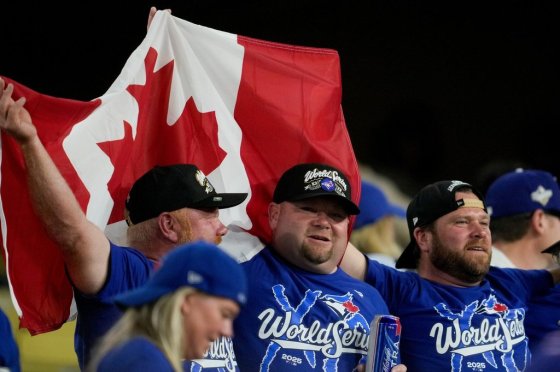 Toronto Blue Jays fans celebrate after Game 5 of baseball's World Series against the Los Angeles Dodgers Wednesday in Los Angeles. (AP Photo/Ashley Landis / The Associated Press)