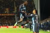 Marseille's Mason Greenwood, right, celebrates with Marseille's Timothy Weah after scoring his sides first goal during the French League One soccer match between Lens and Marseille in Lens, France, Saturday, Oct. 25, 2025. (AP Photo/Jean-Francois Badias)