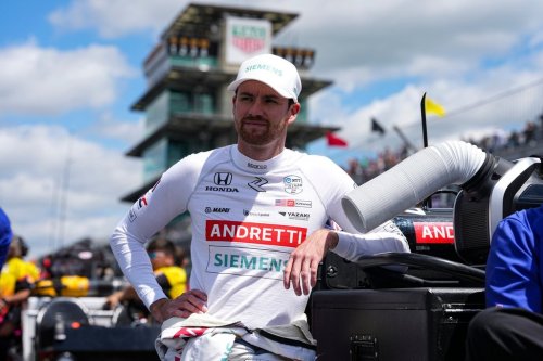 FILE - Kyle Kirkwood leans on a tool box as he waits for is turn during qualification for the Indianapolis 500 auto race at Indianapolis Motor Speedway in Indianapolis, Saturday, May 17, 2025. (AP Photo/Michael Conroy, file)