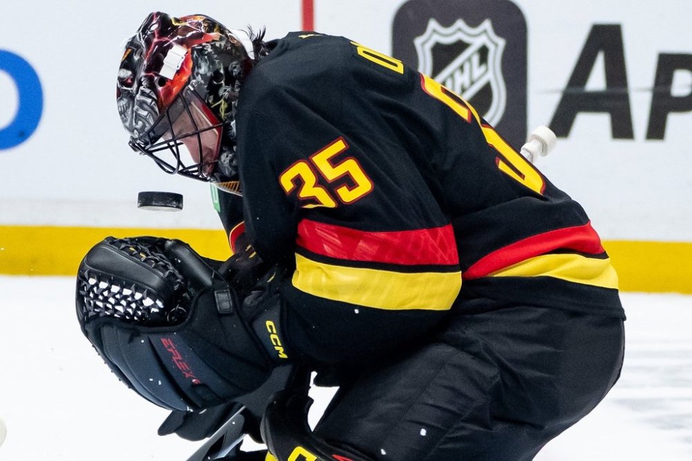 Vancouver Canucks goaltender Thatcher Demko (35) stops a shot from Edmonton Oilers' Isaac Howard, not seen, during first period NHL hockey action in Vancouver, B.C., Sunday, Oct. 26, 2025. THE CANADIAN PRESS/Ethan Cairns