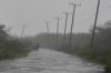 People walk along a road during the passing of Hurricane Melissa in Rocky Point, Jamaica, Tuesday, Oct. 28, 2025. THE CANADIAN PRESS/AP-Matias Delacroix