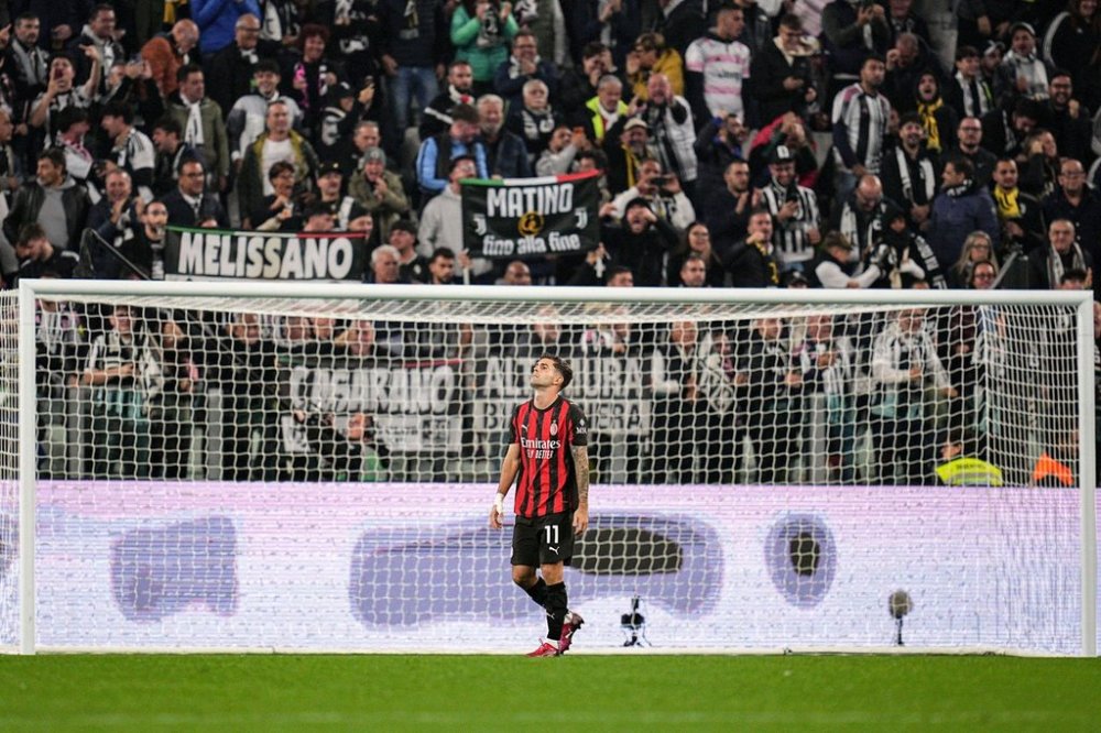 AC Milan's Christian Pulisic reacts after missing a scoring chance during the Serie A soccer match between Juventus and AC Milan at the Allianz Stadium in Turin, Italy, Sunday Oct. 5, 2025. (Marco Alpozzi//LaPresse via AP)