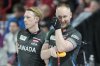 Canada's skip Brad Jacobs (right) and Marc Kennedy react during their semifinal match against Scotland at the World Men's Curling Championship in Moose Jaw, Sask. on Saturday April 5, 2025. THE CANADIAN PRESS/Chris Young