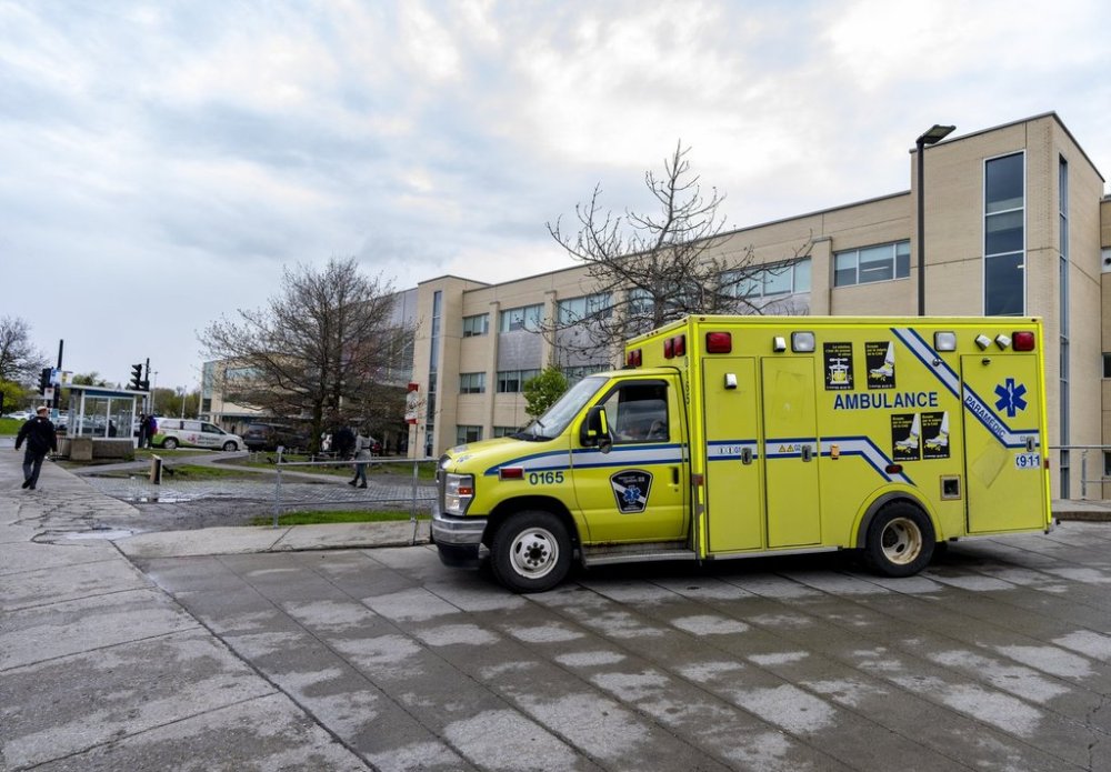 An ambulance sits outside of Maisonneuve-Rosemont Hospital in Montreal on Tuesday, May 6, 2025. THE CANADIAN PRESS/Christinne Muschi
