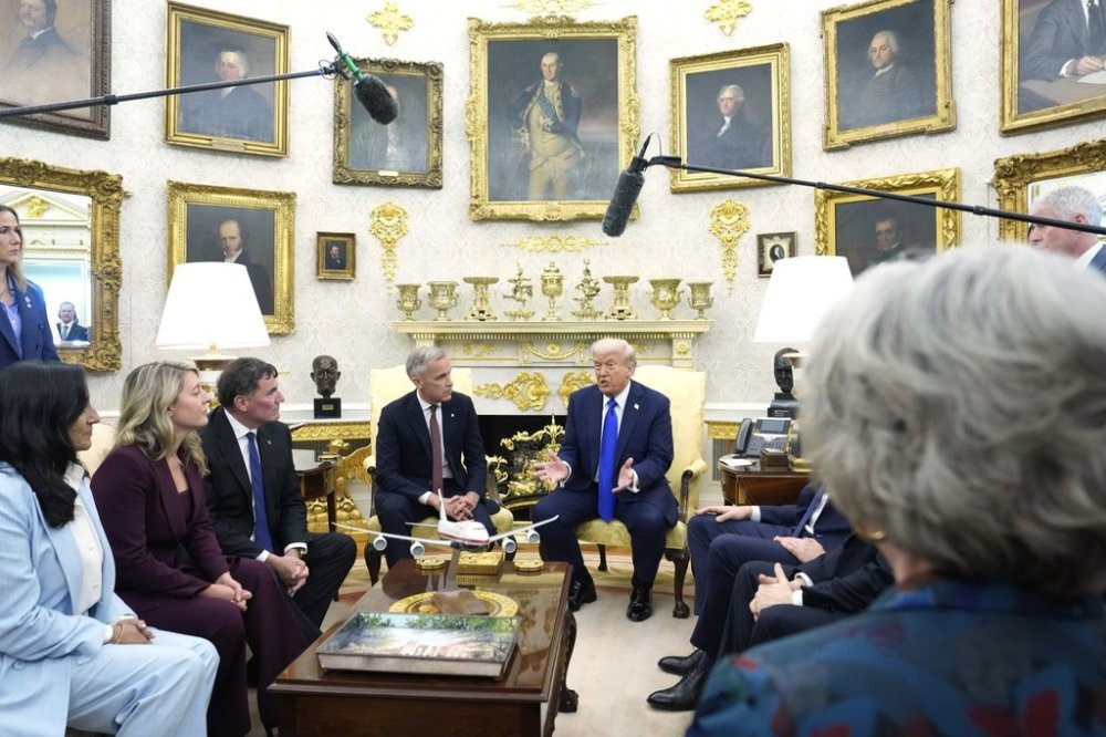 Prime Minister Mark Carney and U.S. President Donald Trump hold a press conference at the White House in Washington, D.C., Tuesday, Oct. 7, 2025. THE CANADIAN PRESS/Adrian Wyld