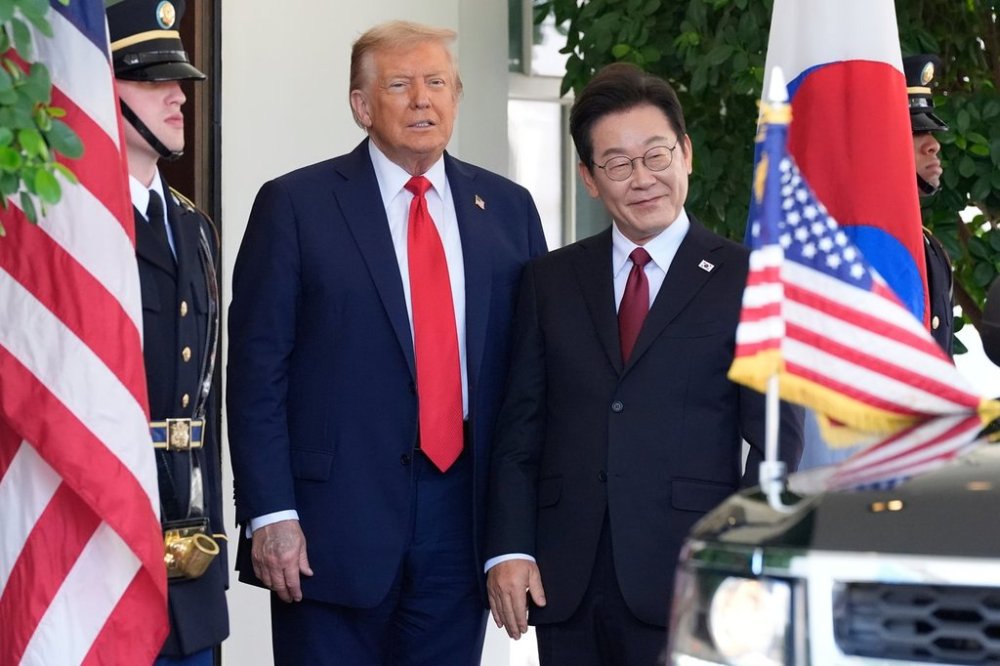 FILE - President Donald Trump, left, greets South Korean President Lee Jae Myung upon his arrival at the White House, on Aug. 25, 2025, in Washington. (AP Photo/Alex Brandon, File)