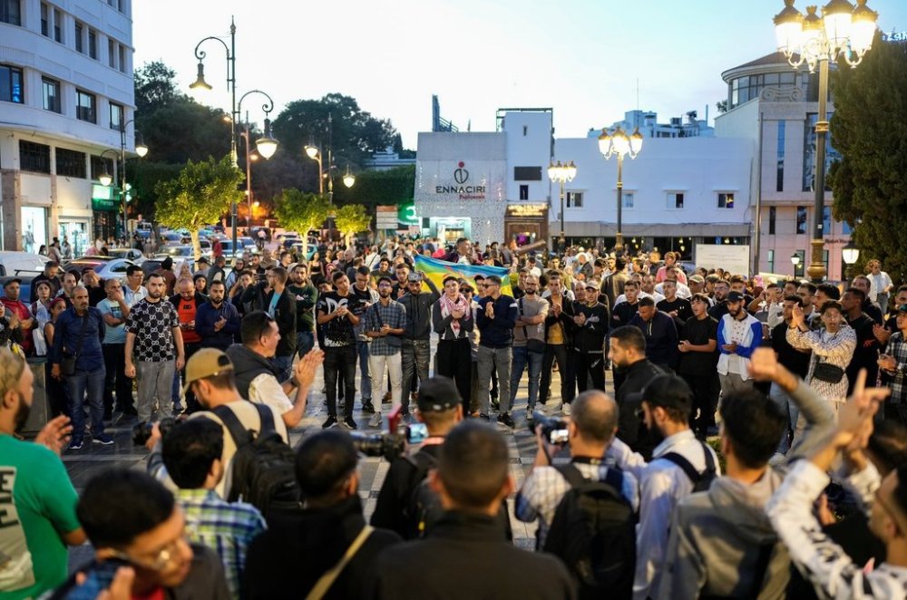 People take part in a youth led protest calling for education and healthcare reforms, in Tangier, Morocco, Saturday, Oct. 18, 2025. (AP Photo/Mosa'ab Elshamy)