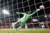 Belgium goalkeeper Thibaut Courtois can't stop a goal by Wales' Nathan Broadhead during the World Cup European Qualifying soccer match between Wales and Belgium at the Cardiff City Stadium in Cardiff, Monday, Oct. 13, 2025. (David Davies/PA via AP)