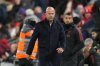 Liverpool's manager Arne Slot walks off the pitch after the English League Cup fourth round soccer match between Liverpool and Crystal Palace in Liverpool, England, Wednesday, Oct. 29, 2025. (AP Photo/Jon Super)