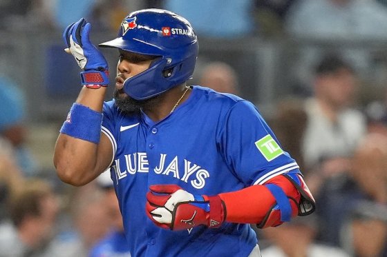 Toronto Blue Jays' Vladimir Guerrero Jr. reacts as he rounds the bases after hitting a two-run home run against the New York Yankees on Tuesday. (Frank Franklin II / The Associated Press)