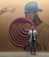 Carey O'Reilly poses in front of a Ken Griffey Jr. art installation at T-Mobile Park in Seattle in this undated handout photo. THE CANADIAN PRESS/Handout — Carey O'Reilly (Mandatory credit)