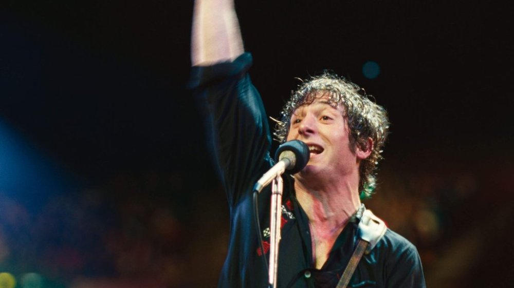 This image released by 20th Century Studios shows Jeremy Allen White as Bruce Springsteen in a scene from