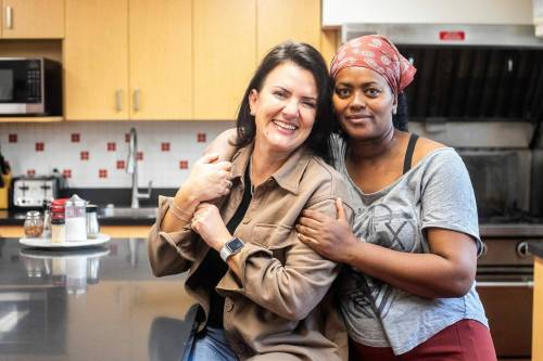 MIKAELA MACKENZIE / FREE PRESS Lucia Whitney, who volunteers making meals at Holy Names House of Peace (left), with neighbour Mekdes on Friday, Oct. 3, 2025. The non-profit provides a safe home for newcomer women. For Aaron Epp story. Free Press 2025