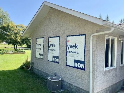 Marc LaBossiere photos / Free Press
                                Outside, the three former window openings are covered in Tyvek and sealed with Tuck tape to protect against the weather.
