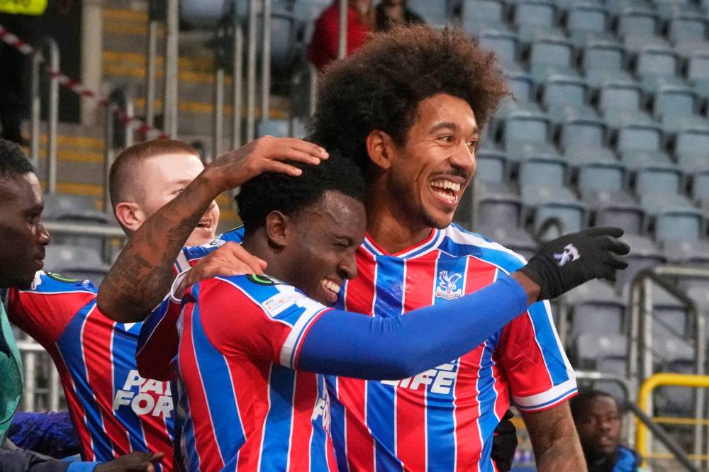 CZAREK SOKOLOWSKI / THE ASSOCIATED PRESS
Crystal Palace’s Eddie Nketiah (centre left) celebrates with teammate Chris Richards after scoring his side’s second goal during Conference League play Thursday.