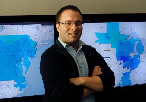 Finance. Matthew Hudson,CEO of Invenia Technical Computing Corporation with monitors showing realtime pricing markets of the PJM (left) and MISO electrical grids. Invenia is a small company using Big Data to do all sorts of forecasting analytics related to the energy markets. Martin Cash story Wayne Glowacki / Winnipeg Free Press Dec.23. 2013