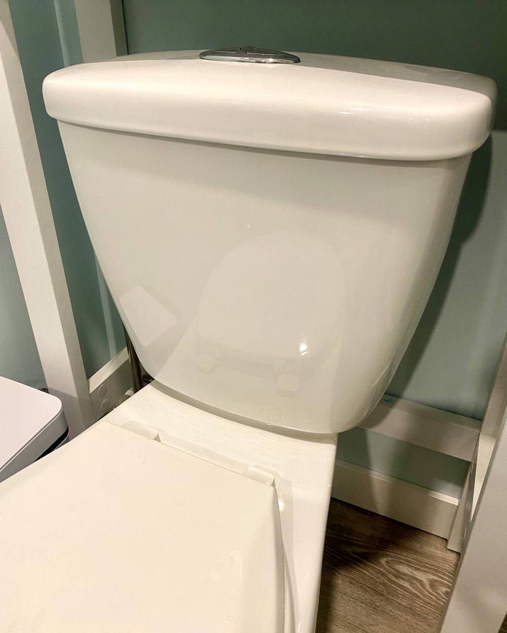 The kind of two-piece toilet that has a tank fastened to a base.