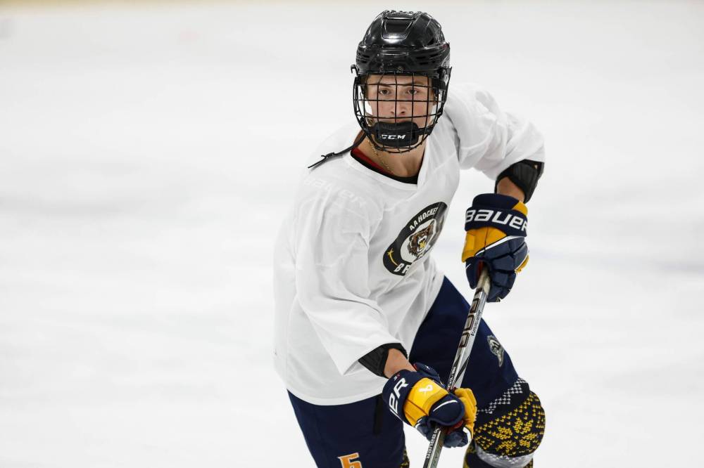 JOHN WOODS / FREE PRESS
JH Bruns student Kristjan Hansen (5) tries out for the new team at Southdale arena.