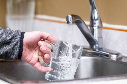 MIKAELA MACKENZIE / WINNIPEG FREE PRESS Tap water in Winnipeg on Monday, March 27, 2023. CTV tested Winnipeg’s water for asbestos fibres for the story and found some was present. It’s estimated that about 720 to 750 kms of City of Winnipeg pipes are made of concrete infused with asbestos. For Joyanne story. Winnipeg Free Press 2023.