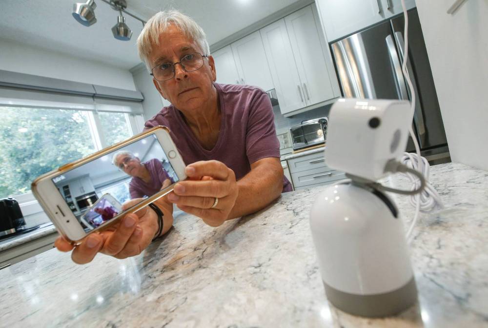 JOHN WOODS / FREE PRESS
Terry Lutomsky bought and installed home security cameras last year.