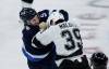 JOHN WOODS / THE CANADIAN PRESS
Winnipeg Jets' Luke Schenn (5) and Los Angeles Kings' Jeff Malott (39) fight during first period NHL action in Winnipeg on Saturday.