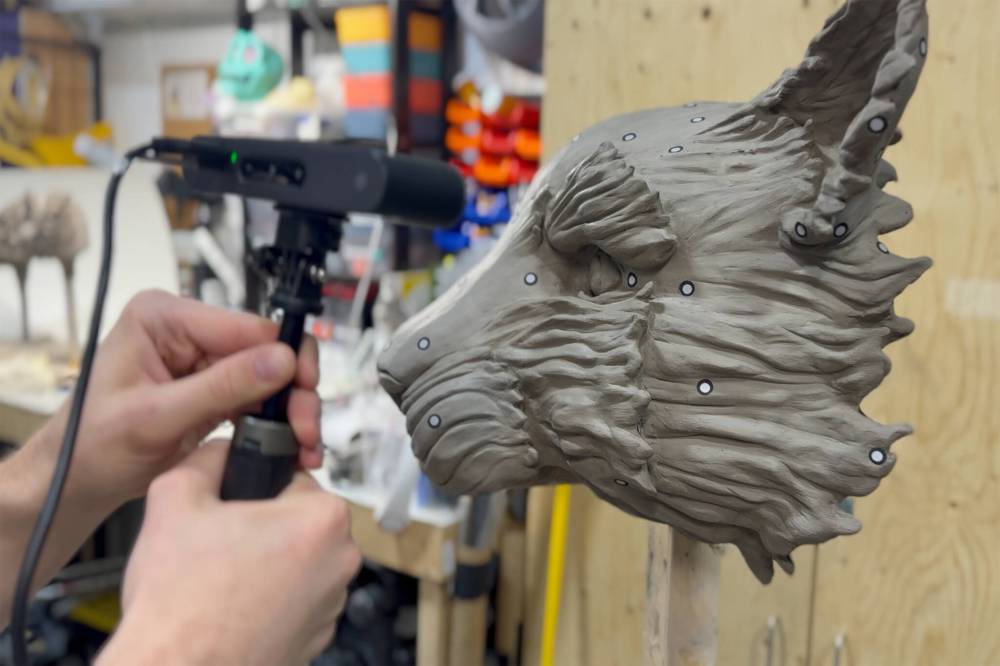 SUPPLIED
The Puppet Stuff team scans a miniature sculpted version of Richard Parker the Tiger for 3D printing.