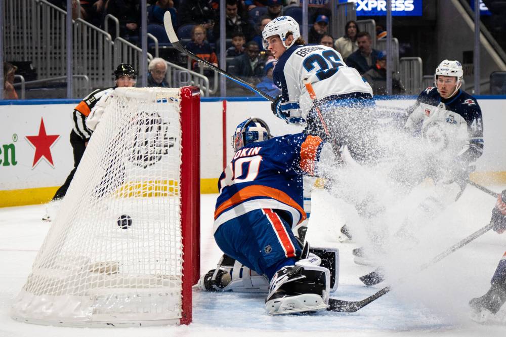 Angelina Katsanis / THE ASSOCIATED PRESS
Winnipeg Jets’ Morgan Barron (36) opened the scoring Monday against the New York Islanders. The forward has already produced a pair of highlight-reel goals and has four points in his first three games of the season.