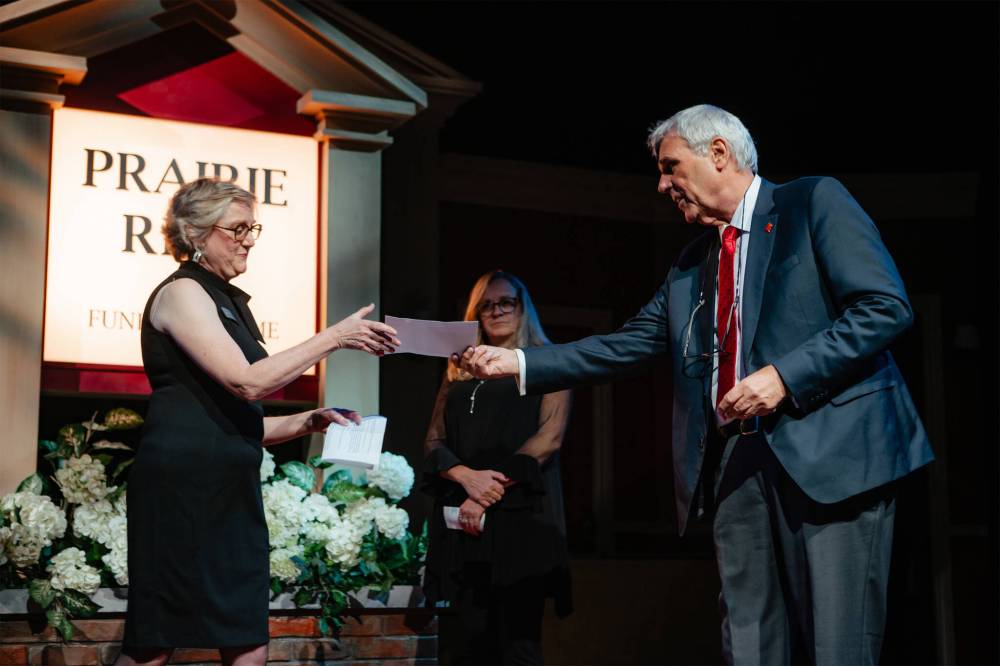 JOEY SENFT PHOTO
Colin Jackson presents a donation to PTE artistic director Ann Hodges on Wednesday.