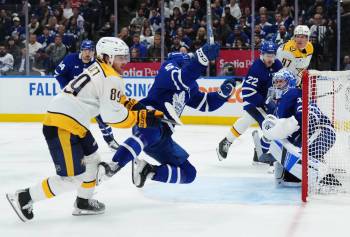 Nathan Denette / THE CANADIAN PRESS
                                Nashville Predators forward Ozzy Wiesblatt (left) notched a pair of assists during his emotional season debut against the Leafs on Tuesday.