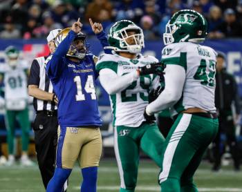 Winnipeg Blue Bombers kicker Sergio Castillo (14) celebrates his game-winning field goal against the Saskatchewan Roughriders during second half CFL action in Winnipeg Friday, October 17, 2025. THE CANADIAN PRESS/John Woods