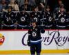 JOHN WOODS / THE CANADIAN PRESS
                                Winnipeg Jets’ Mark Scheifele acknowledges the crowd’s applause after the in-game announcement that he’s the franchise point leader in the first period against the Nashville Predators in Winnipeg on Saturday.