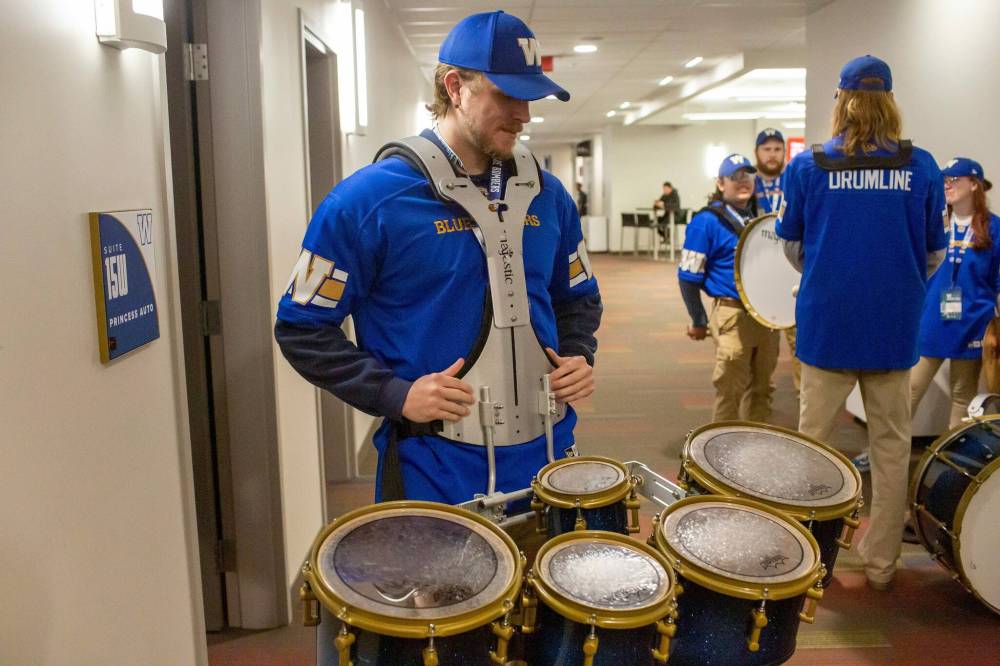 Logan Cashin, 27, with the tenor drums (Brook Jones / Free Press)