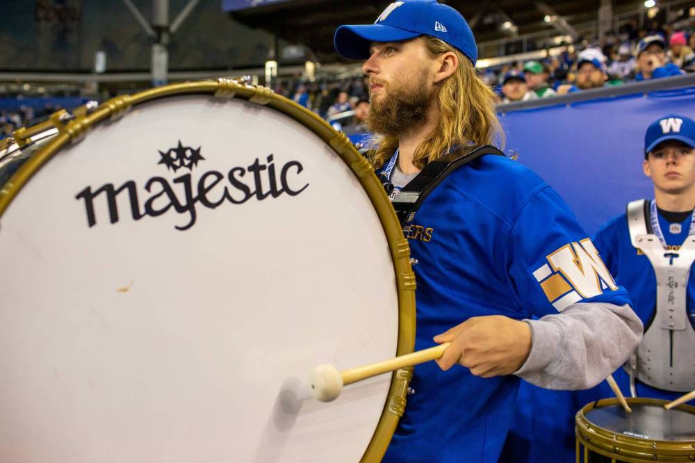 Blue Bombers drumline member Daniel De Ryck, 21, has handled the bass-drum duties for the Bombers for four years. (Brook Jones / Free Press)
