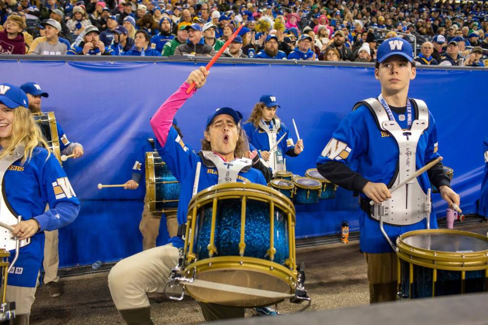 When it comes to repertoire, Jaremy Ediger says if fans name it, the drumline can probably play it. (Brook Jones / Free Press)