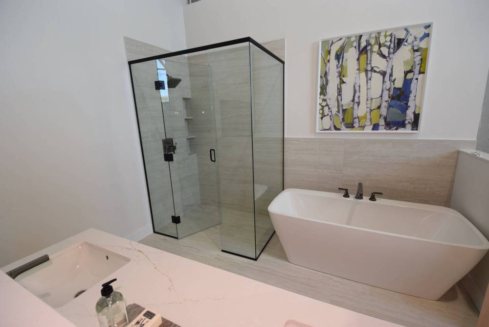 TODD LEWYS / FREE PRESS
                                Ensuites will be spa-inspired retreats with deep freestanding soaker tubs and gorgeous walk-in showers.