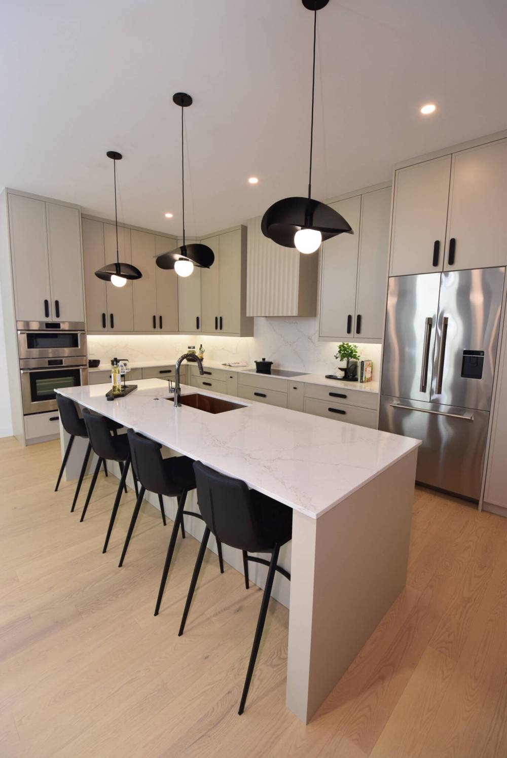 TODD LEWYS / FREE PRESS
                                Kitchens in the bungalow condos planned for Six Eleven on the River on Wellington Crescent will feature elegantly crafted cabinets, quartz countertops and matching quartz backsplashes, and high-end stainless-steel appliances.