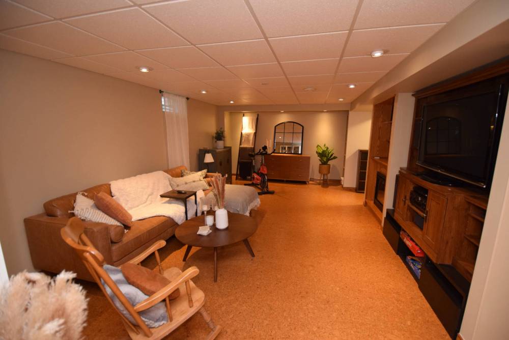 TODD LEWYS / FREE PRESS
                                Head downstairs and you find a spacious rec room with cork flooring, office area, two flex spaces, a three-piece bath and laundry/mechanical room.