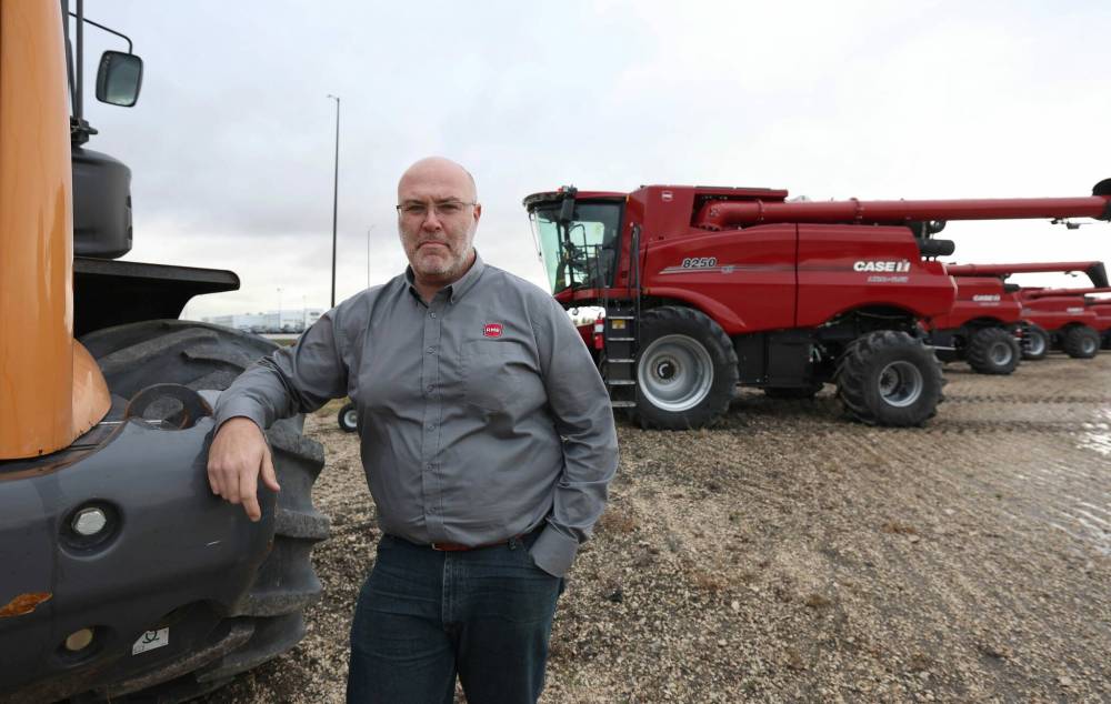 Equipment sales manager Matthew Tkachyk says inflation is playing a significant role in rising costs. (Ruth Bonneville / Free Press)