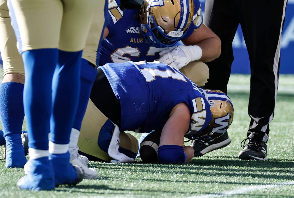 JOHN WOODS / THE CANADIAN PRESS
Winnipeg Blue Bombers quarterback Chris Streveler (17) gets sacked and goes off with an injury during first half CFL action against the Montreal Alouettes in Winnipeg, Saturday, Oct. 25, 2025.