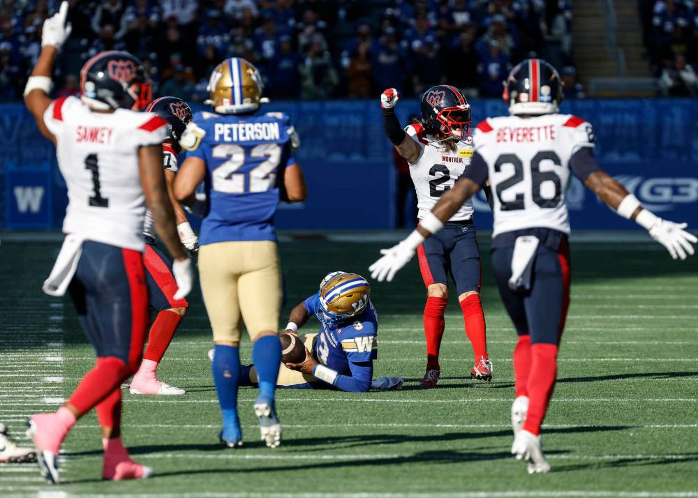 JOHN WOODS / THE CANADIAN PRESS
Montreal Alouettes’ Marc-Antoine Dequoy (24) celebrates sacking Winnipeg Blue Bombers quarterback Terry Wilson (3) during first half CFL action in Winnipeg, Saturday, Oct. 25, 2025.